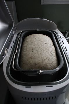 a loaf of bread sitting inside of a washing machine