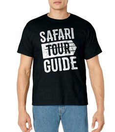 a man wearing a black shirt that says safari tour guide