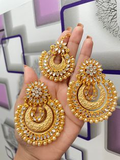 Golden tikka set Kundan Jewelry Sets With Chandbali Earrings, Festival Jewelry Sets With Matching Round Earrings, Festive Round Jewelry Sets With Matching Earrings, Gift Chandbali Tikka With Hand Set, Chandbali Tikka Gift, Chandbali Tikka As A Gift, Festive Chandbali Jewelry Sets With Matching Earrings, Hand Set Chandbalis As A Gift, Diwali Jewelry Sets With Matching Earrings