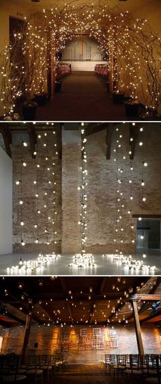 a room with many lights hanging from the ceiling and on the floor, there is a large amount of white balls in the air