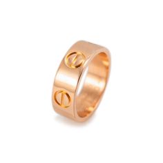 Brand: Cartier  Gender: Ladies  Metal Type: 18K Rose Gold  Size: 3.25  Width: 5.30 mm  Weight: 4.60 Grams  18K rose gold Cartier love ring with a soft-square shank. The metal was tested and determined to be 18K rose gold. Engraved with "45" and "750". The "Cartier" trademark (or hallmark) can also be found on the item.  Comes with the original box & papers.  Pre-owned in excellent condition. Might show minor signs of wear. Luxury Engraved Rose Gold Promise Ring, Luxury Rose Gold Engraved Promise Ring, Cartier Rose Gold Wedding Ring, Luxury Engraved Rose Gold Open Ring, Luxury Rose Gold Open Engraved Ring, Luxury Rose Gold Couple Rings For Promise, Luxury Cartier Rose Gold Ring, Rose Gold Promise Couple Rings With Open Design, Promise Rose Gold Couple Rings With Open Design