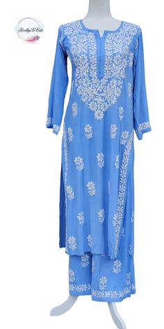 This is  soft hand-embroidered chikankari Kurti and palazzo set. It gives a very smooth feel to your skin and hand embroidery on this Kurti makes it set apart from other Kurtis. TOP Fabric - Heavy Rayon Neck Type: Round Neck BOTTOM FABRIC- rayon with hand embroidery  Please note : DUPATTA is not included. Size - Size Available - 38-46 inch size is measured is Bust size. If you need any clarification regarding Size Please contact me Diwali Chikankari Embroidery Palazzo Set, Diwali Maxi Length Palazzo Set With Chikankari Embroidery, Diwali Palazzo Set With Chikankari Embroidery In Maxi Length, Unstitched Maxi Length Sharara With Chikankari Embroidery, Festival Long Sleeve Palazzo Set With Chikankari Embroidery, Traditional Palazzo Set With Chikankari Embroidery For Spring, Traditional Maxi Length Wear With Chikankari Embroidery, Traditional Embroidered Maxi Palazzo Set, Traditional Embroidered Maxi Length Palazzo Set