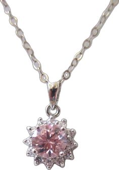 Dazzling Sparkling Pink Jewelry, Pink Jewelry With Round Center Stone, Pink Crystal Fine Jewelry, Pink Cubic Zirconia Round Pendant, Formal Pink Brilliant Cut Necklace, Dazzling Pink Necklaces With Sparkling Stones, Dazzling Pink Necklace With Sparkling Stones, Fine Jewelry In Pink Crystal, Pink Cubic Zirconia Round Pendant Jewelry