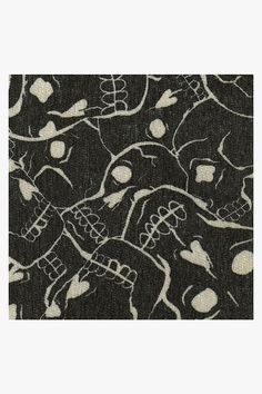 a black and white pattern with skulls on the side, as well as an image of a