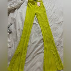 Lime Green Pleated Split Hem Pants. Size Us 4. Brand New, Never Worn With Tags. Chic High-cut Summer Pants, Fitted High-cut Leg Summer Pants, Trendy Split Bottoms For Party, Trendy Party Bottoms With Split Design, Trendy Party Bottoms With Split, Fitted Full-length Green Bottoms, Spring Party Bottoms With High-cut Leg, Fitted Full Length Green Bottoms, Fitted Split Pants For Night Out