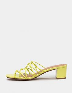 Adjustable Synthetic Heels With Padded Heel, Yellow Low Heel Casual Heels, Spring Low Heel Mules With Reinforced Heel, Casual Yellow Low Heel Shoes, Casual Low Heels With Wrapped Heel, Casual Yellow Low Heel Heels, Adjustable Modern Heels For Summer, Modern Adjustable Heels For Summer, Casual Mules With Wrapped Low Heel