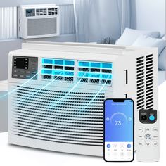 a room air conditioner with an appliance next to it and a phone