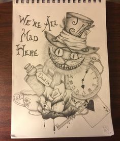 a drawing of a cat with a clock on it's face that says we're all mad here