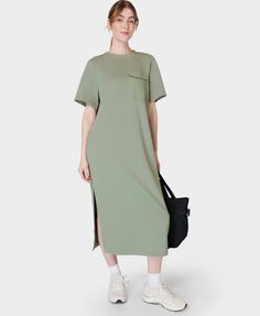 Our new, throw-on maxi dress that's perfect for travel days. Made from a soft and breathable cotton blend. Oversized fit for comfortable all-day wear. Front length: 125cm /49". Model wears size S and is 178cm/5'10" tall. Style Code: SB9749Colour: Savannah Green Casual Cotton T-shirt Dress With Relaxed Fit, Spring Green Cotton T-shirt Dress, Casual Solid Color T-shirt Dress For Loungewear, Green Cotton Casual T-shirt Dress, Summer Dress With Side Slits And Crew Neck, Summer Dresses With Side Slits And Crew Neck, Oversized Cotton Casual Maxi Dress, Oversized Cotton Maxi Dress For Summer, Solid Color Cotton Maxi Dress For Daywear