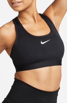 Work up a sweat in this padded sports bra featuring wide straps and signature moisture-wicking tech. Racerback Dri-FIT moisture-wicking technology Lined 72% polyester, 28% spandex Machine wash, line dry Imported Sports Bra With Built-in Padding For Training, Athleisure Sports Bra With Built-in Padding And Medium Support, Racerback Sports Bra With Built-in Padding For Sports Events, Technical Sports Bra With Built-in Padding For Training, Sports Bra With Built-in Padding For Medium Support, Padded Activewear For Sports Events, Black Sports Bra With Built-in Padding For Training, Fitted Padded Activewear Sportswear, Padded Fitted Sportswear Activewear