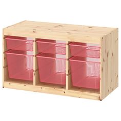 a wooden shelf with pink bins on it