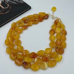 "This beautiful Amber Gold Statement Necklace is completely handmade with high quality. This gorgeous Necklace goes with everything and everywhere, holiday party or after work with friends! The Necklace made from blue acrylic clouds effect beads 23*19 mm. The Necklace length is 17\" short layer and 21\" long layer plus 3 inch extender chain for adjustment, and has light weight. The Necklace would be a PERFECT GIFT for you or for your family and friends! Statement Necklace made in a smoke and pet Acrylic Clouds, Honey Yellow, Yellow Necklace, Golden Necklace, Silver Necklace Statement, Necklace Chunky, Gold Statement Necklace, Friend Necklaces, Chunky Necklace