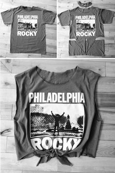 some t shirts that are on top of a wooden floor with the words philadelphia rock