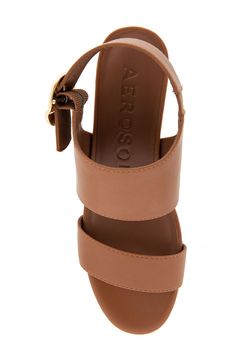 Contoured cushioning supports you in this faux-leather sandal featuring a wide straps with gleaming hardware and balanced by a low wedge heel. Synthetic upper, lining and sole Imported Adjustable Buckle Closure Synthetic Wedge Sandals, Leather Wedge Sandals With Block Heel And Adjustable Strap, Synthetic Double Strap Platform Wedge Sandals, Synthetic Double Strap Wedge Sandals With Heel Strap, Wedge Sandals With Buckle Closure, Synthetic Double Strap Wedge Sandals, Synthetic Wedge Sandals With Cushioned Footbed And Block Heel, Synthetic Double Strap Wedge Sandals With Heel Loop, Beach Faux Leather Wedge Sandals With Removable Insole