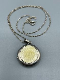 A beautiful Art Deco Sterling Silver and yellow Guilloche Enamel Circular Locket and Chain. Both locket and chain are hallmarked for sterling silver In good condition for its age, There is minor wear, all of which is entirely commensurate with its age however please ensure you study my pictures carefully and decide for yourself upon the condition of the before purchasing Exquisite and detailed guilloche enamel, there is some slight missing enamel around the outer edge, please see my pictures to Guilloche Enamel, Enamel Bracelet, Star Art, Silver Enamel, Locket Necklace, Snake Chain, Sterling Silber, Beautiful Bracelet, Vintage Sterling Silver