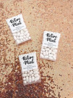 three bags of retinoe mints sitting on top of a sequin floor