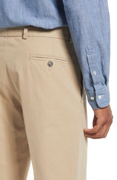 Lightweight cotton poplin elevates versatile flat-front khakis in a traditional, full-tailored cut. 18" leg opening; 10" front rise Zip fly with button closure 100% cotton Machine wash, tumble dry Imported Classic Chinos For Business Casual In Summer, Classic Summer Chinos For Business Casual, Classic Summer Work Pants With Pockets, Cotton Dress Pants With Belt Loops, Classic Relaxed Fit Pants With Button Cuffs, Spring Chino Cotton Twill Work Trousers, Business Casual Cotton Bottoms With Flat Front, Classic Business Casual Cotton Bottoms, Classic Pants With Button Cuffs For Spring