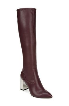 Streamlined, contemporary style defines a knee-high boot fashioned with a pointy toe and lofty block heel. 1 1/4" heel 15 1/2" shaft; 15 1/2" regular calf circumference 15 1/2" shaft; 16 1/2" wide calf circumference Back zip closure Synthetic upper and lining/rubber sole Imported Women's Shoes Wide Calf, Franco Sarto, Knee High Boots, Fashion Boots, Contemporary Style, Riding Boots, Knee High, Heeled Boots, Block Heels