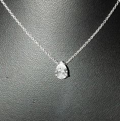 KGM Diamonds ltd 💎 manually polished with ❤️ Handmade item beautiful impressive natural, not enhanced, pear shaped (teardrop) polished diamond in a solitaire white gold pendant setting with a gold necklace diamond: natural shape: Pear brilliant weight:  0.5-0.60 carat color: H clarity: SI1 GIA certified gold: 14k white necklace: 42 cm or 16.8 inch free gift box free international shipping this diamond was polished in our polishing factory, handmade. As well as this pendant handndmade  in our je Luxury Solitaire Teardrop Jewelry, Pear Diamond Necklace, Princess Diamond Earrings, Rough Diamond Jewelry, Teardrop Diamond, Solitaire Diamond Pendant, Gia Certificate, White Gold Necklace, Gem Diamonds