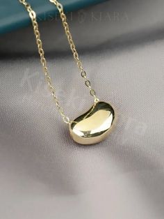 NOT GOLD PLATED, NOT GOLD FILLED! All our jewelry are stamped with a gold hallmark to certify the metal purity of the item. Price listed is for Pendant/ Charm Only. The necklace chain is sold separately here:  https://www.etsy.com/listing/677473471/gold-chain-choker-made-from-pure-14k Product Details ☑14K SOLID GOLD ☑DIMENSION: 7x11MM 💓Tarnish resistant and sweat resistant  💓Hypoallergenic, made without lead, nickel and cadmium Gold Information *9K gold is 9 parts pure gold or 37.5% pure. *10K Necklace Everyday, Gold Chain Choker, Chain Choker, Pure Gold, Dainty Necklace, Necklace Chain, 10k Gold, Gold Chain, Chains Necklace