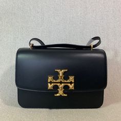 It Was A Brand New Customer Returned Item And It Did Not Come With A Dust Bag!!! Will Provide One That I Bought From Another Seller. Tory Burch Tag Was Removed To Prevent Store Return. Item Is In Brand New Never Been Carried Condition As Shown In Photos Guaranteed. 100% Authentic Tory Burch Guaranteed !!!! This Bag Is Convertible. Can Be Carried As A Shoulder Bag Or Cross Body Bag. Dimensions: 10" Wide Across Bottom X 7" Tall Center X 2.5" Deep. Strap Drop Doubled 11.5", Single 21". Interior: 3 High-end Black Square Flap Bag, Tan Square Shoulder Bag With Gold-tone Hardware, High-end Tan Crossbody Shoulder Bag, Tan Square Evening Bag, High-end Tan Shoulder Bag With Branded Hardware, High-end Tan Shoulder Bag With Gold-tone Hardware, Tan Satchel With Branded Hardware For Evening, Evening Tan Satchel With Branded Hardware, Tory Burch Bag