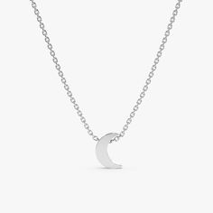 Luna Keep your dreams close with our dainty Mini Plain Gold Moon Pendant Necklace. This celestial charm features a solid 14k gold moon pendant with a touch of thickness for a dimensional look. The minimal design and polished gold finish create a timeless and versatile piece that complements any outfit. Crafted from high-quality 14k gold (available in yellow, white, or rose gold), this necklace offers long-lasting durability and a touch of luxury. - Handmade- Solid Gold- Size of Moon: 7 x 5 mm- The thickness of the Moon: 2 mm All pieces come beautifully boxed in suede pouches you can always use when traveling! Gold Moon Necklace, Star Necklace Gold, Mini Moon, Moon Pendant Necklace, Gold Moon, White Gift Boxes, Moon Pendant, Moon Necklace, Gold Set