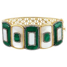 "18kt gold:43.924g, Diamond:1.79ct, Malachite:19.32ct, MOP:11.77ct" Size-58 x 48 mm Luxury Multi-stone Gold Bracelet, Luxury Gold Diamond Bracelet With Gemstones, Luxury Multi-stone Diamond Bracelet For Formal Occasions, Luxury Green Cuff Bracelet For Formal Occasions, Luxury Yellow Gold Cuff Bracelet With Gemstone, Luxury Gold Diamond Bracelet With Multi-stone, Luxury Multi-stone Diamond Bracelet, Luxury Green Gemstone Bangle, Luxury Green Bangle