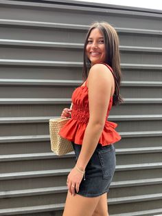 our harli tank is a solid reddish / rustic orange shirred button down tank top:: perfect for concerts, july 4th celebrations or as a fun everyday summer top! made with a flirty fit and flare design with its ruched waist and ruffle hem. add some shape to your look with this easy piece! shop more tops! sizing, details & care model sizingHolley is 5'3" 125lbs with a 34" bust, 31" waist and 35" hip wearing a smallDee is 5'5" 135lbs wearing a smalldetails- 97% cotton, 3% elastane care- hand wash cold Rustic Orange, Dressy Pants, Hair Accessories Jewelry, Casual Skirts, Dressy Tops, Long Shorts, Clothes Collection, Denim Pant, Summer Top