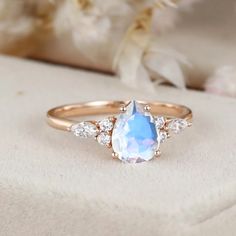 Indulge in timeless beauty with our vintage 14k rose gold women's june birthstone ring featuring a 1.5 carat pear cut moonstone. This ring is a radiant expression of the timeless beauty of both vintage design and the june birthstone. Unique Gemstone Engagement Rings, Rose Gold Promise Ring, June Birthstone Ring, Pear Ring, Moonstone Engagement, Promise Ring Gift, Moonstone Engagement Ring, India Jewelry, June Birthstone