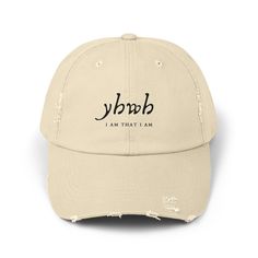 YHWH I Am That I Am Christian Hats Made with 100% cotton twill for high-end comfort and durability, these custom distressed hats bring all the style and practicality one needs in daily life. The low profile along with the D-ring closure on a self-fabric hideaway strap ensures both proper protection from the sun and that perfect, adjustable fit.  Please note: Small details and letters within 1/2 inch of the seam line should be avoided due to the nature of DTF printing. Small prints may lift from the fabric. Prefer wider logos and images, or ensure text has a sufficient background to improve adhesion. .: 100% cotton twill .: Sewn-in label .: Closure: self-fabric hideaway strap with metal D-ring slider .: Printed using Direct to Film (DTF) technology  .: Please note: Due to a special finishin Christian Hats, Christian Merch, Christian Streetwear, Hebrew Names, Jesus Is King, Distressed Hat, Names Of God, Dtf Printing, Small Details