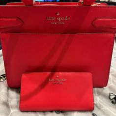 Brand New, Never Used Red Kate Spade Tote Bag With Matching Wallet And Removable Shoulder Strap. Outside Pockets On The Front And Back, Zipper Closure, And Pockets Inside. Wallet Has 13 Card Slots, Id Slot, 4 Money Openings And A Change Zipper On The Back. Purse:10.75”W, 5”D, And 8.5”H Not Including Straps Wallet: 6.75”W, 3.5”H Classic Red Bag With Card Slots, Designer Red Wallet For Daily Use, Red Designer Wallets For Daily Use, Classic Red Wallets With Removable Pouch, Designer Red Bags With Interior Card Slots, Luxury Red Wallet With Removable Pouch, Red Leather Evening Wallet, Red Leather Wallet With Removable Pouch, Designer Red Wallet With Interior Card Slots