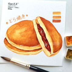 a watercolor painting of pancakes with ketchup and mustard on it next to paintbrushes