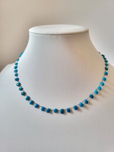 * This necklace is made entirely of natural blue turquoise stones, pear drop shape of approximately 3mm. * The stones are tied together with a very resistant brown silk thread, an ancestral method of tying cultured pearls. *Handmade item * The findings are gold filled, the clasp is stainless steel. * Total length of the necklace is 42cm. Crewneck. * Free delivery by post by registered letter * The necklace will be carefully sent in its reusable protective cotton pouch *Gift for her, gift for wife, earring for women * Instagram _atelier768_, Facebook Atelier768, Garnet Round Beads Necklace For Gift, Multicolor Round Beads Multi-stone Necklaces, Multicolor Multi-stone Necklaces With Round Beads, Blue Multi-strand Natural Stone Necklaces, Blue Multi-strand Natural Stone Necklace, Pink Raspberry, Cotton Pouch, Earring For Women, Garnet Pendant