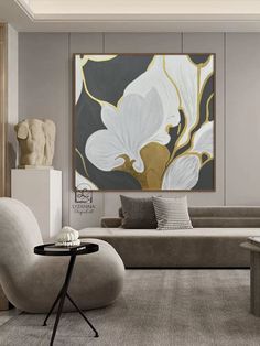 an elegant living room with modern furniture and artwork