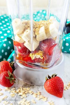 strawberries and bananas in a blender with oats