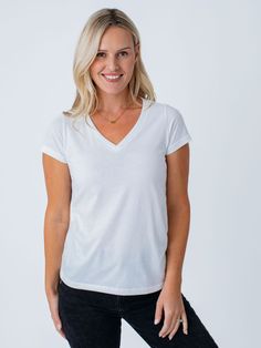 Imagine slipping into a cloud of pure comfort. Made with our signature soft fabric and designed for a flattering fit, it's the perfect combination of style and comfort. It's the tee you'll reach for again and again, because it just feels so darn good to wear. Our women’s tees now have an updated fit Improved shape across in all sizes to better fit women’s bodies True Plus sizing offered in our 2X and 3X sizes means our tees are cut using specific patterns to flatter your figure Unsung Hero, Tape Measures, White Crew Neck, Women Essentials, All White, Polished Look, V Neck Tee, Try On, Winter Women