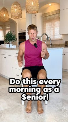 a man sitting on top of a kitchen counter holding a microphone in his hand and the caption reads, do this every morning as a senior