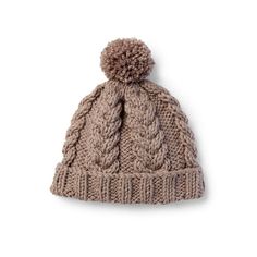 a knitted beanie hat with a pom - pom on the top