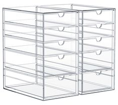 three clear drawers are stacked on top of each other, one is open and the other is closed