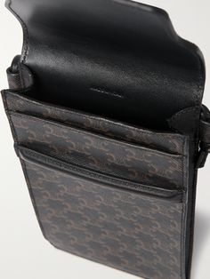 CELINE HOMME's pouch is ideally sized to hold your phone, credit cards and earbuds, the essentials when you're on the go. It's made from monogrammed coated-canvas trimmed with black leather. Men Clutch Bag, Weekend Bags, Belt Bags, Print Coat, Men's Bags, Phone Pouch, Brown Coat, Luggage Accessories, Dark Brown Leather