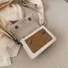 • Beige Square Bag With Adjustable Strap, Rectangular Flap Bag With Large Capacity For School, Large Capacity Rectangular Flap Bag For School, Rectangular Large Capacity Flap Bag For School, Trendy Beige Rectangular Bag, Rectangular Beige School Bag, Trendy Rectangular Canvas Bag With Adjustable Strap, Rectangular School Shoulder Bag, Trendy Beige Rectangular Shoulder Bag