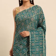 Turquoise Green colored saree is made from zomato fabric which is highlighted with beautiful bandhani foil print work and tassels border as shown. comes along unstitched raw silk blouse piece which you can customise as per your design/style. Occasion - You can wear this saree for festivals, parties and ideal for any fashionista. Note:- The actual product may differ slightly in color and design from the one illustrated in the images when compared with computer or mobile screen. Measurements: Saree : Chiffon : 5.5 Mtrs Blouse : Chiffon : 0.8 Mtr Material: Chiffon Stitch Type: Unstitched Country of Origin: India Care Guide: Dry Clean Green Bandhani Print Semi-stitched Lehenga, Green Bandhani Print Pre-draped Saree For Eid, Unstitched Green Saree With Bandhani Print, Festival Semi-stitched Bandhani Print Saree, Luxury Semi-stitched Bandhani Print Saree, Saree Chiffon, Blouse Chiffon, Raw Silk Blouse, Baby Skin Care