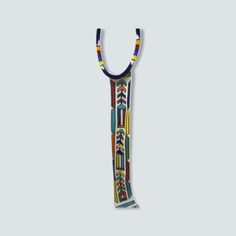 Young women in Ndebele and Zulu tradition have to Bhica (which means to wear traditional beadwork) for cultural events such as coming of age ceremonies, celebrations, weddings, funerals and sometime birthdays. This oversized necklace is what would be worn for these occasions. Size: 52cmL x 8cmW x 16cm neck Beaded Necklaces For Traditional Ceremonies And Festivals, Multicolor Beaded Necklaces For Traditional Ceremonies, Colorful Traditional Beaded Necklaces For Ceremonies, Multicolor Artisan Necklace For Traditional Ceremonies, Traditional Colorful Beaded Necklaces For Ceremonies, Artisan Multicolor Necklaces For Traditional Ceremonies, Artisan Multicolor Necklace For Traditional Ceremonies, Adjustable Multicolor Necklace For Ceremonial Occasions, Multicolor Necklace For Traditional Festivals