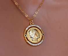 "This is a 14kt gold ancient Roman coin necklace for women. This pendant features a Roman head coin with pave crystals and two enamel stones. Pendant is 14k gold filled, measures 18mm. This coin comes in two colors, the black enamel stone or the aqua color stone shown in last photo, please choose color. This is a beautiful coin charm that comes on a 14k shiny gold filled cable chain with spring clasp in back. Comes in a cute gift box. *Model has a small neck, is wearing a 16\" length. Please cho 14kt Gold Jewelry, Ancient Roman Coins, Clean Sterling Silver, Necklaces Women, Gold Coin Necklace, Coin Pendant Necklace, Roman Coins, Cute Gift Boxes, Clover Necklace