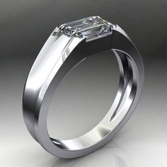 A classic men's band in your choice of metal, but with a modern twist - a conflict-free 1.75 carat NEO moissanite center stone. Band measures 6mm wide at the top and narrows a bit down to 3.3mm at the base of the shank.Available in 14k white, yellow or rose gold, and also platinum. Make your selection to the right to see pricing on the various metals.Check out the Cash, live and in the flesh. ;)https://www.instagram.com/p/BbR_wC4hPzC/[[----- GEMSTONE DETAILS -----]]One 1.75 carat 8x6mm colorless Formal Emerald Cut Emerald Ring With Tension Setting, Gia Certified Modern Emerald Cut Ring, Modern Gia Certified Emerald Cut Ring, Modern Mens Wedding Bands, Mens Wedding Bands White Gold, Mens Gold Wedding Band, Rings Ceremony, The Flesh, Men Diamond Ring