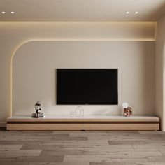 a large flat screen tv mounted to the side of a wall in a living room