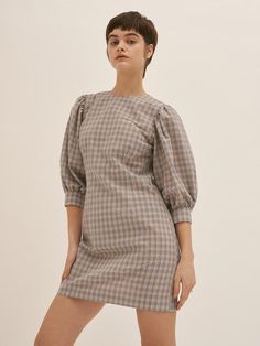 Editor's NotesBLUV's effortlessly girlish and feminine aesthetic is showcased with check dress- Check dress with volume sleeves- Crafted from seer sucker cotton blend fabric - Volume sleeves - Slightly fitted waist line- Back zip closure- Lovely mood - Good to wear as summer point dressMeasurement (inch)- Shoulder: 13.4in- Chest:25.2in- Sleeve: 15.5in- Length: 31.7n* Model info: Height 5'5 Chest 31' Waist 23' Hip 35'Composition & Care- 40 % Cotton 60 % Polyester- Dry Fall Workwear Puff Sleeve Dress With Elastic Sleeves, Fall Workwear Puff Sleeve Dress, Fitted Plaid Puff Sleeve Dress, Workwear Mini Dress With Bishop Sleeves, Fall Workwear Mini Dress With Gathered Sleeves, Spring Plaid Puff Sleeve Dress, Chic Plaid Puff Sleeve Dress, Seer Sucker, Volume Sleeves