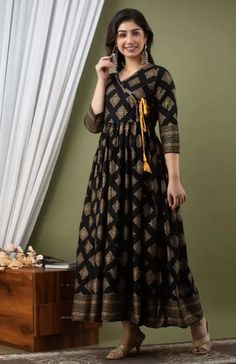 Material: Viscose Rayon Sizes: To Fit Bust(in inches): S(34), M(36), L(38), XL(40) Pattern: Ethnic Motifs Printed Wash Care: Dry Clean Style: Indo-Western Dress For Women, Indian Dress, Kurti, Fusion Dress Occasion: Party, Festive, Wedding Dispatch within 7 days Black Cutdana Anarkali Set With Straight Kurta, Black Straight Kurta Anarkali Set With Cutdana, Black Anarkali Dress With Cutdana Work, Black Bollywood Traditional Wear With Bandhani Print, Black Long Sleeve Dress For Navratri, Black Bandhani Print Dupatta For Navratri, Unstitched Black Block Print Traditional Wear, Black Cutdana Dress For Eid, Black Dresses With Printed Motifs For Festive Season