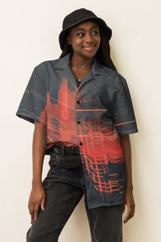 Check out this bold button-down shirt with a trendy oversized fit, that works well for outfit layering! Cyberpunk Urban Button-Up Shirt 🌆🔶 Step into the future with our Hawaiian Shirt, an essential for any streetwear enthusiast or EDM lover. This orange and gray synthwave shirt blends surreal design with ultimate summer comfort, making it a standout choice for any occasion. Product Highlights: Edgy Design: This shirt features a striking blend of orange and gray in a surreal, synthwave-inspired Streetwear Short Sleeve Tops With Buttons, Casual Button-up Blouse With Graphic Print, Short Sleeve Buttoned Tops For Streetwear, Short Sleeve Tops With Buttons For Streetwear, Relaxed Fit Graphic Print Button-up Blouse, Collared Shirt With Button Closure For Streetwear, Urban Collared Tops For Streetwear, Button-up Camp Shirt For Streetwear, Button-up Shirt With Button Closure For Streetwear