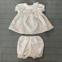 Vintage B.T. Kids Baby Girl Lace Dress Set Perfect outfit for christening, Easter or any other festivities. Absolutely gorgeous set of a lovely dress in cream color with lace collar and rose detail, puffy sleeves and back button closure. Comes with a matching pair of bloomers. Size 18 months.  Excellent vintage condition. Cute Fitted Lace Baptism Dress, Cute Baptism Dress With Lace Trim, Cute Baptism Dress With Lace Trim For Formal Occasion, Cute Lace Trim Baptism Dress For Formal Occasions, Cute Lace Baptism Dress With Lace Trim, Cute Fitted Baptism Dress With Lace Trim, Fitted Cute Baptism Dress, Cute Fitted Baptism Dress, Cute Cream Sets For Baptism